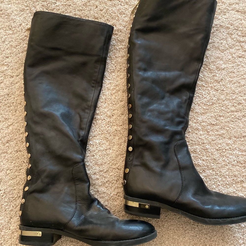 Like new Vince Camuto tall boots . Black with goldstone hardware .